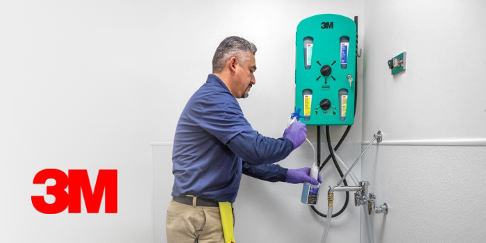 Image of a person operating the chemical management system